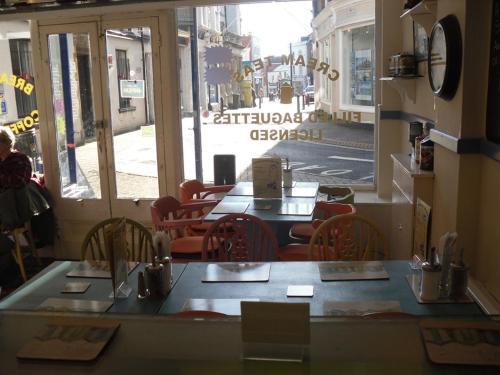 A restaurant or other place to eat at Watch House Barn 