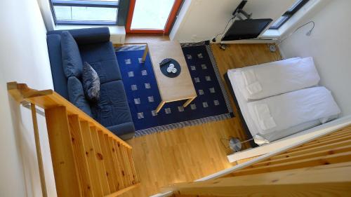 an overhead view of a living room with a couch at Hordatun Hotel in Røldal