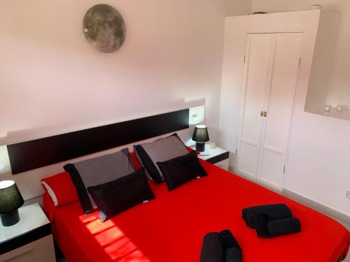 Postel nebo postele na pokoji v ubytování La dama gris - Fuerteventura Holiday Wi-Fi