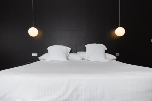Letto o letti in una camera di Hotel Veracruz Plaza & Spa