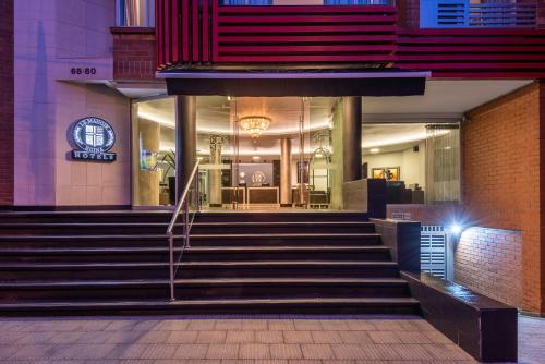 a set of stairs in front of a building at Hotel Egina Medellin in Medellín