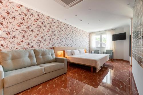 Телевизор и/или развлекательный центр в Hotel Condado Ourense