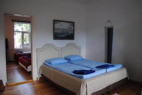 Кровать или кровати в номере Aadelheide Family Apartments