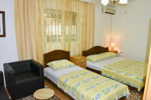 Postel nebo postele na pokoji v ubytování Guesthouse Elsa