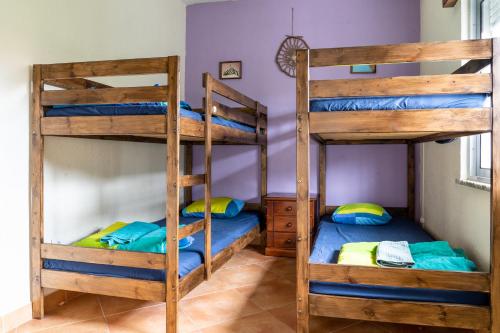 Postel nebo postele na pokoji v ubytování Natural Mystic Hostel