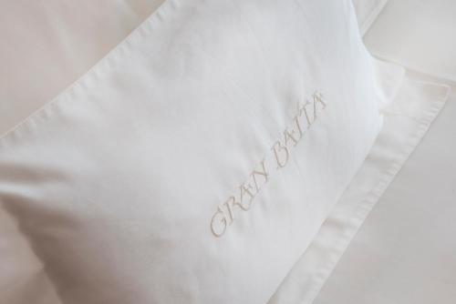 a white envelope with the word engagement written on it at Gran Baita Hotel & Wellness in Courmayeur