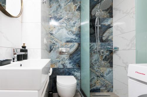 Et badeværelse på Iliana & Sarra Apartment 2