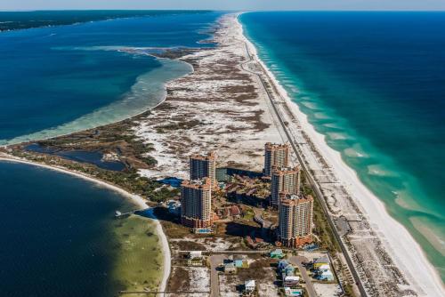 an aerial view of a beach with tall buildings at Portofino Tower 3 Unit 1609 in Pensacola Beach