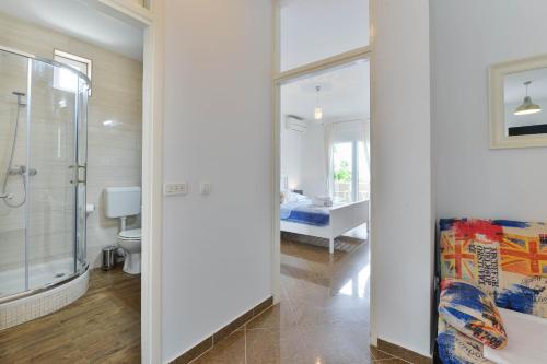 Ένα μπάνιο στο Apartments Kampanel