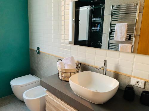 Kylpyhuone majoituspaikassa MB’Apartment