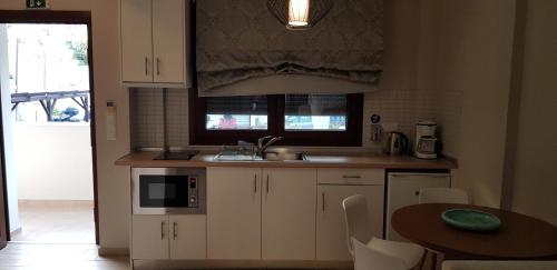Gambar di galeri bagi Hatzoudis Luxury Suites di Chrysi Ammoudia