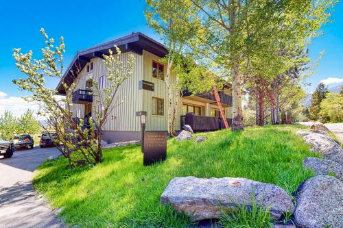 a house with a parking meter in the grass at White Ridge A3 in Teton Village