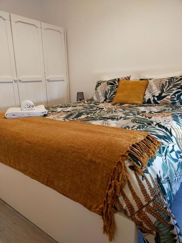 Кровать или кровати в номере Beautiful Infante Apartment