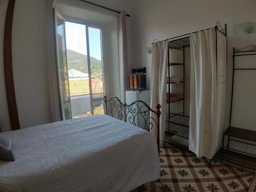 Een bed of bedden in een kamer bij I Colori del Mercato