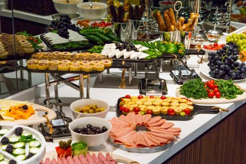 a buffet with many different types of food on a table at MEG HOTEL in Istanbul