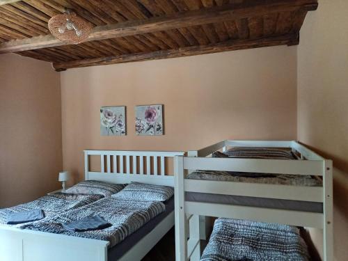 Posteľ alebo postele v izbe v ubytovaní Apartmány na Šumavě