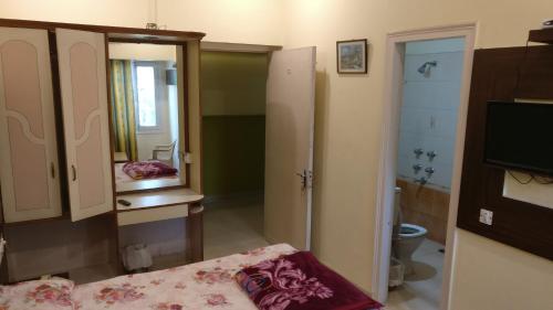 Koupelna v ubytování Samrat Hotel