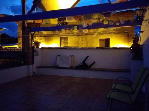 a night view of a building with lights at Casa Rural Boletas in Loporzano