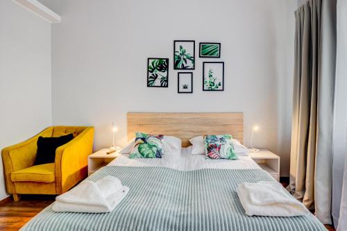 Postel nebo postele na pokoji v ubytování Apartamenty Zdrojowa