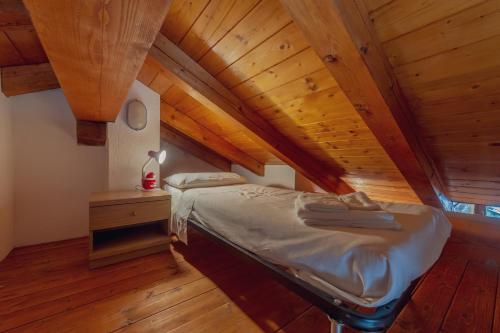 Ένα ή περισσότερα κρεβάτια σε δωμάτιο στο Chalet Pontal 6