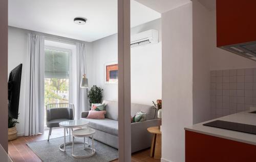 A seating area at Don Fadrique Apartments by Olala Homes