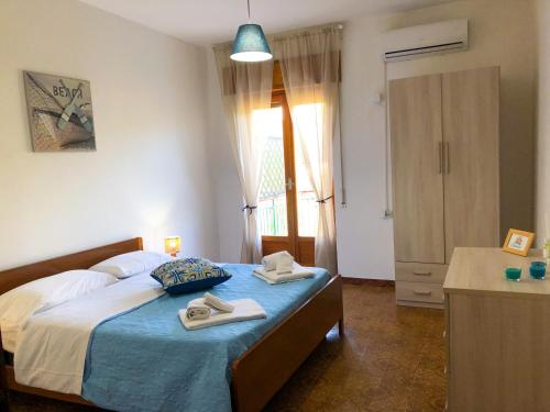 Katil atau katil-katil dalam bilik di Soleado Apartments Caprioli-Palinuro