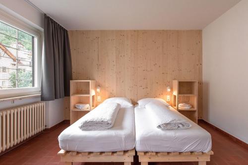 Una cama o camas en una habitación de FinKa