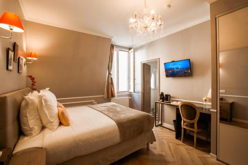 La Maison Gobert Paris Hotel Particulier tesisinde bir odada yatak veya yataklar