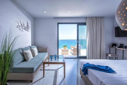 Postel nebo postele na pokoji v ubytování Maritime Suites