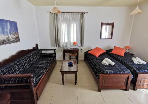 Ένα ή περισσότερα κρεβάτια σε δωμάτιο στο Maison Kronio Lassithi Plateau