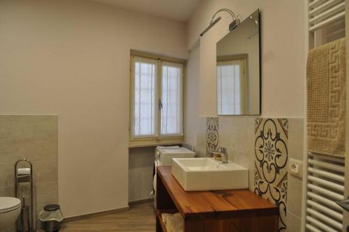 Et badeværelse på appartamento Le Mongolfiere