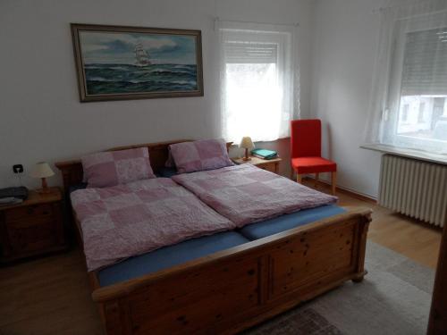 מיטה או מיטות בחדר ב-Familie Beeken - Westerstede
