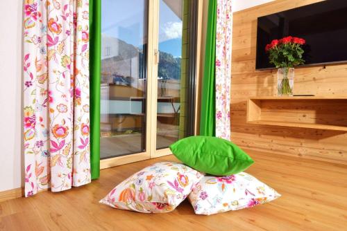 a bean bag chair sitting in front of a window at Appartements Kolb in Tauplitz