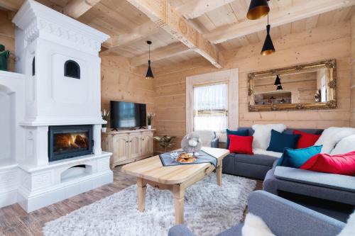 Posezení v ubytování Zasypane Premium House & Sauna in Zakopane by Renters Prestige