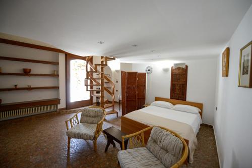 Posteľ alebo postele v izbe v ubytovaní Umbra Idris Holiday Home