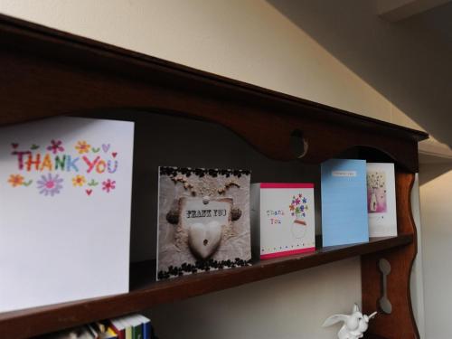 A television and/or entertainment center at Cringleford Guest House 