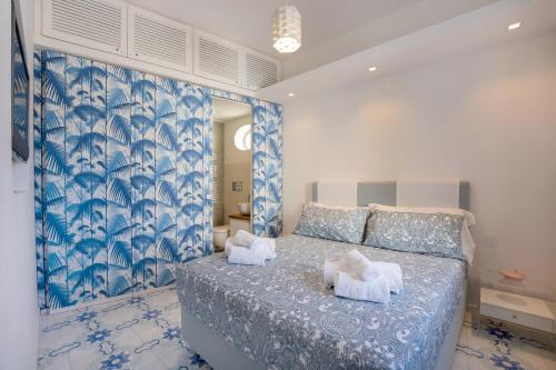 Letto o letti in una camera di Azzurra, Capri