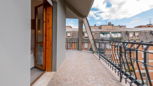 a balcony with a view of a building at Hotel San Marco in Reggio Emilia