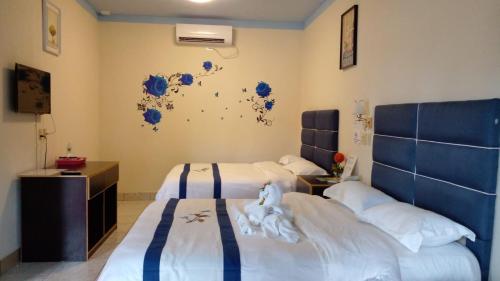 Sunshine View Hotel and Restaurantにあるベッド