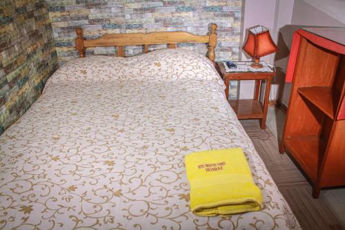 Un ou plusieurs lits dans un hébergement de l'établissement Hotel Virgen del Carmen - Huaraz