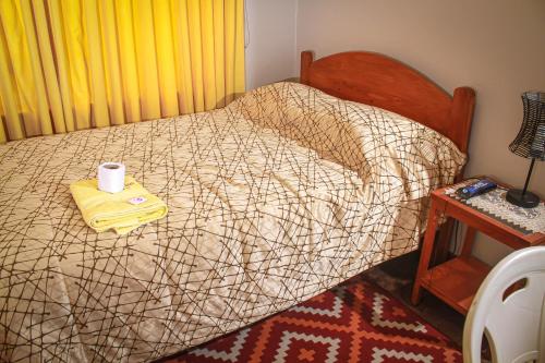 Un ou plusieurs lits dans un hébergement de l'établissement Hotel Virgen del Carmen - Huaraz