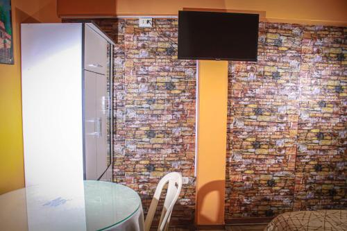 Télévision ou salle de divertissement dans l'établissement Hotel Virgen del Carmen - Huaraz