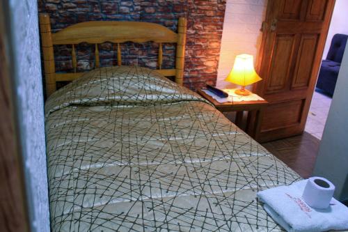 Un ou plusieurs lits dans un hébergement de l'établissement Hotel Virgen del Carmen - Huaraz