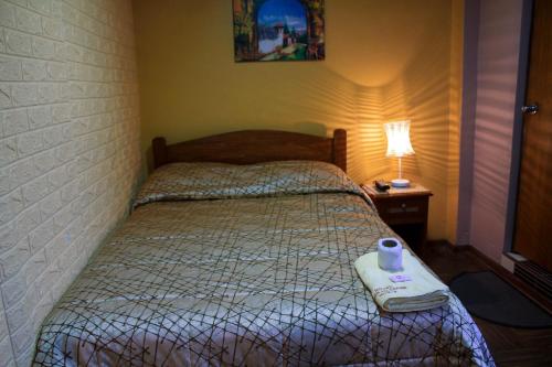 Un ou plusieurs lits dans un hébergement de l'établissement Hotel Virgen del Carmen - Huaraz