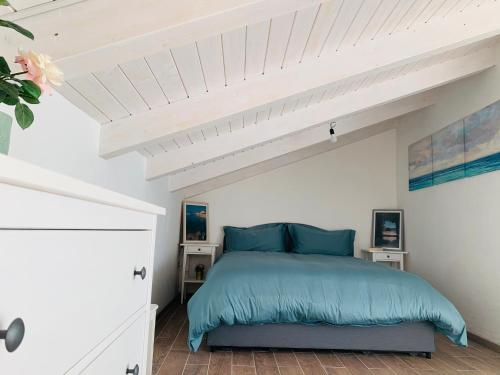 Una cama o camas en una habitación de Casa Vacanze vista mare a Castellabate