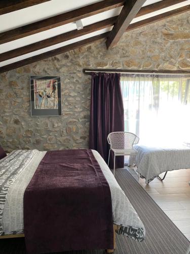 Кровать или кровати в номере Casa Rural Martiamuno Landetxea