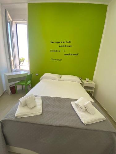 Postel nebo postele na pokoji v ubytování Residenza Baffra