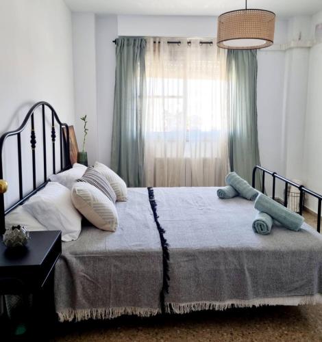 Ένα ή περισσότερα κρεβάτια σε δωμάτιο στο Lovely 4 bed flat