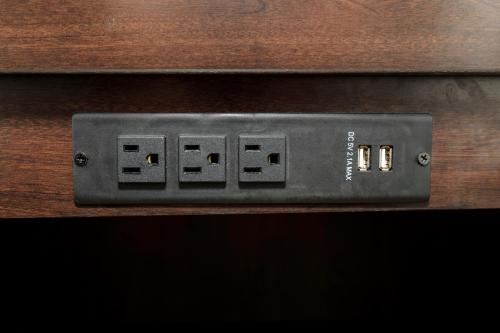 an electrical switch on a wooden cabinet at Red Roof Inn & Suites Lake Charles in Lake Charles