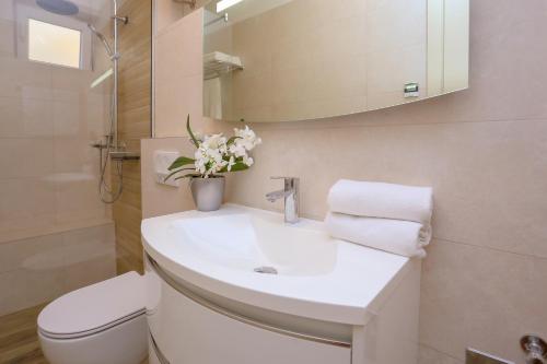 Kúpeľňa v ubytovaní Apartment Dvor